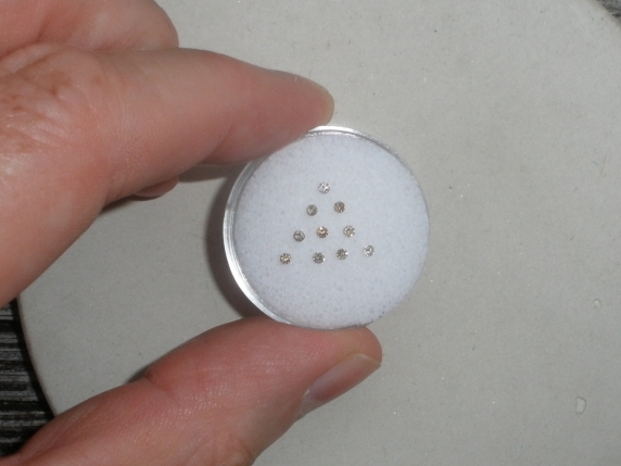 10 Champagne diamond loose rounds 1.5mm each