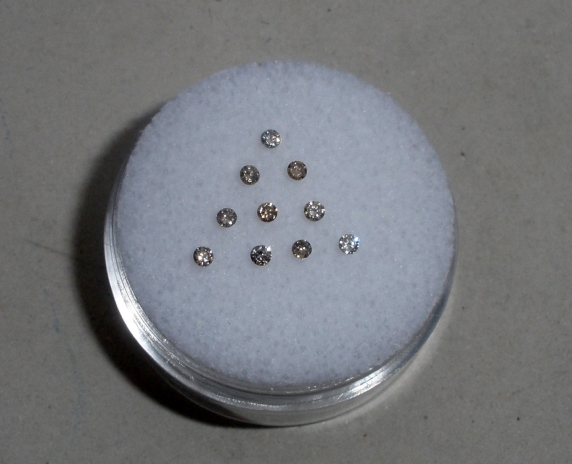 10 Champagne diamond loose rounds 1.5mm each