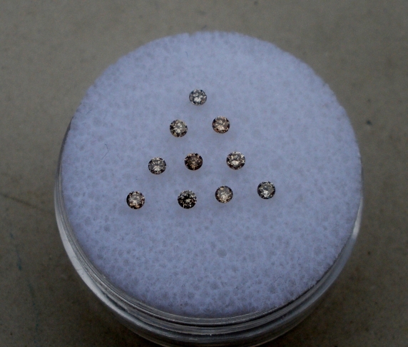 10 Champagne diamond loose rounds 1.5mm each