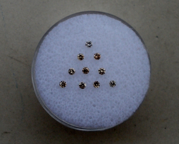 10 Champagne diamond loose rounds 1.5mm each