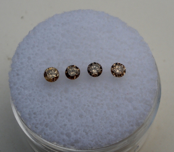 4 champagne diamond loose rounds 2.5mm each
