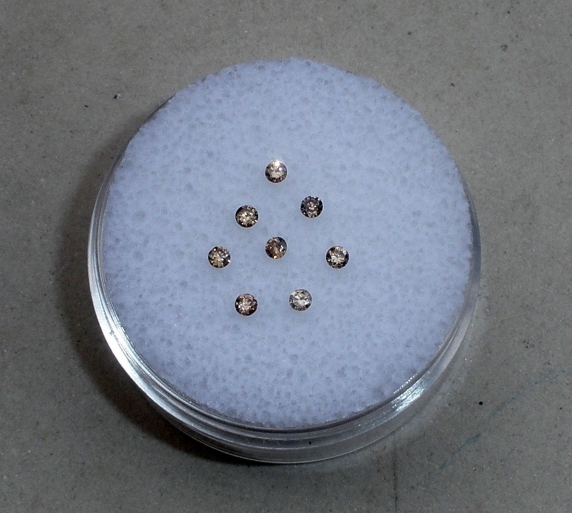 8 Champagne diamond loose rounds 1.5mm each