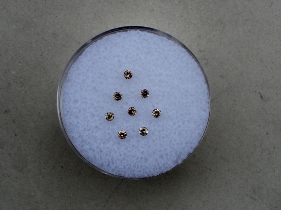 8 Champagne diamond loose rounds 1.5mm each