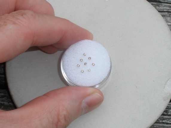 8 Champagne diamond loose rounds 1.5mm each