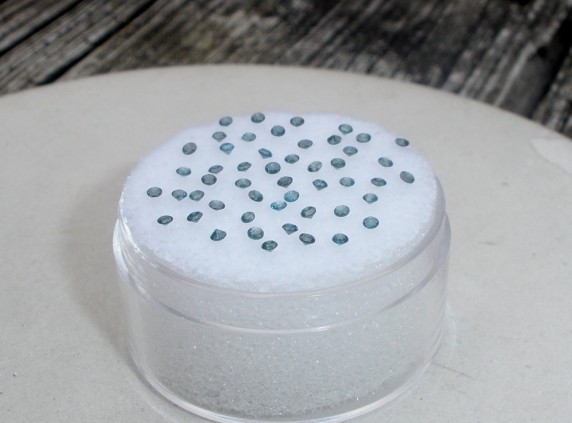 50 blue diamond loose rounds 1.3mm each