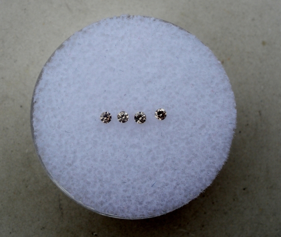 4 champagne diamond loose rounds 1.7mm each