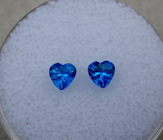 Glacier blue topaz heart gem pair 4mm