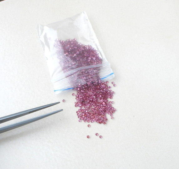 Over 1 Carat Pink Garnet Round Loose Faceted Natural Gem Parcel 1.5mm each Over 1 Carat Pink Garnet Round Loose Faceted Natural Gem Parcel 1.5mm each