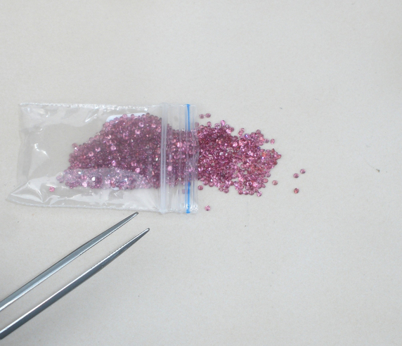 Over 1 Carat Pink Garnet Round Loose Faceted Natural Gem Parcel 1.5mm each Over 1 Carat Pink Garnet Round Loose Faceted Natural Gem Parcel 1.5mm each
