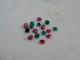 Emerald and ruby round gem mix Emerald and ruby round gem mix