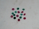 Emerald and ruby round gem mix
