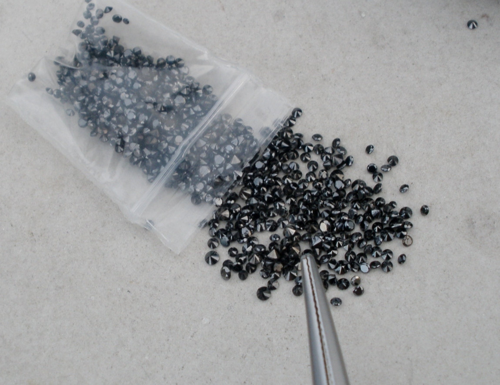 Black diamond round loose parcel over 1 2 carats PinnacleDiamonds